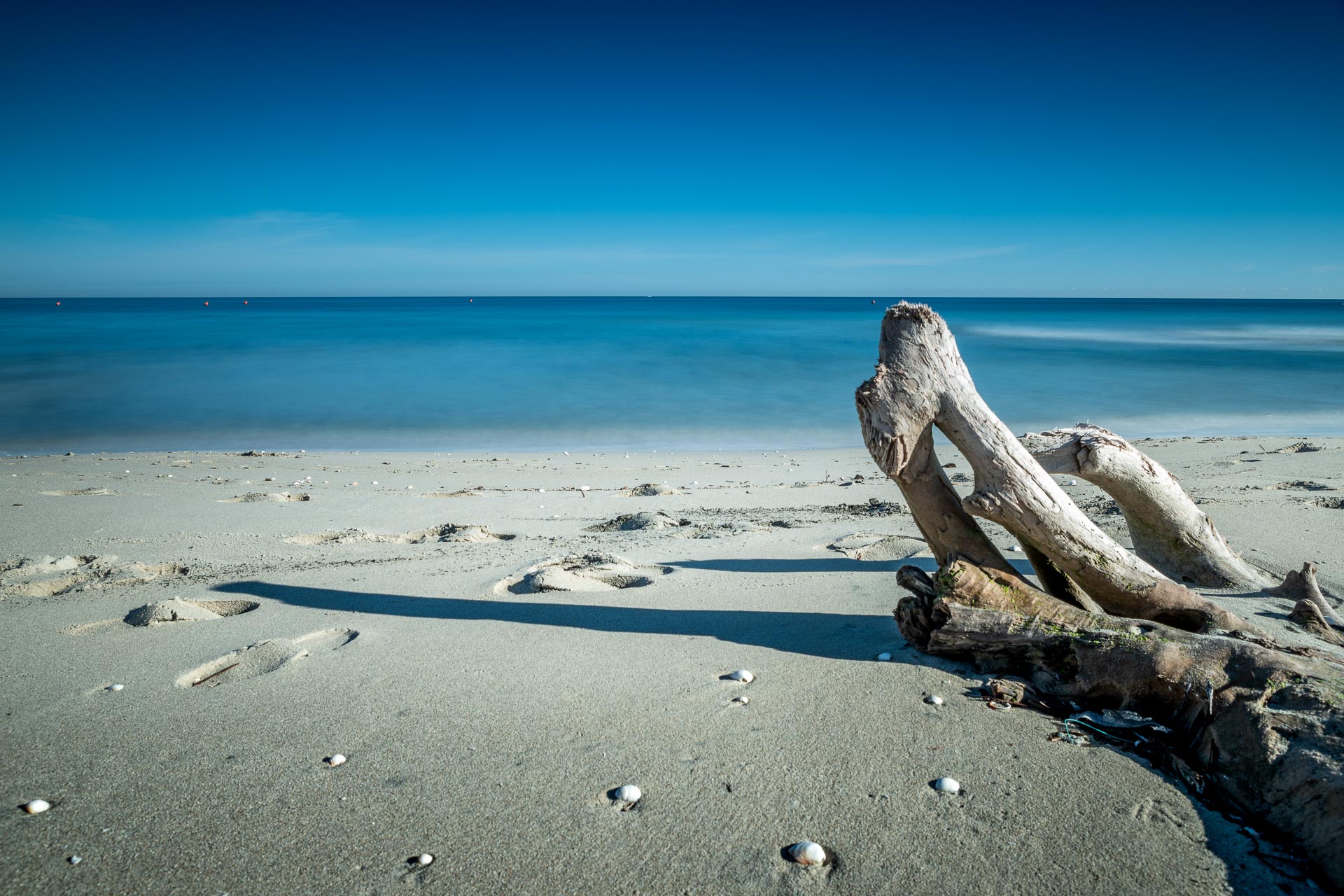 daniele-mercadante-long-exposure-seascape-tronco-mare-inverno